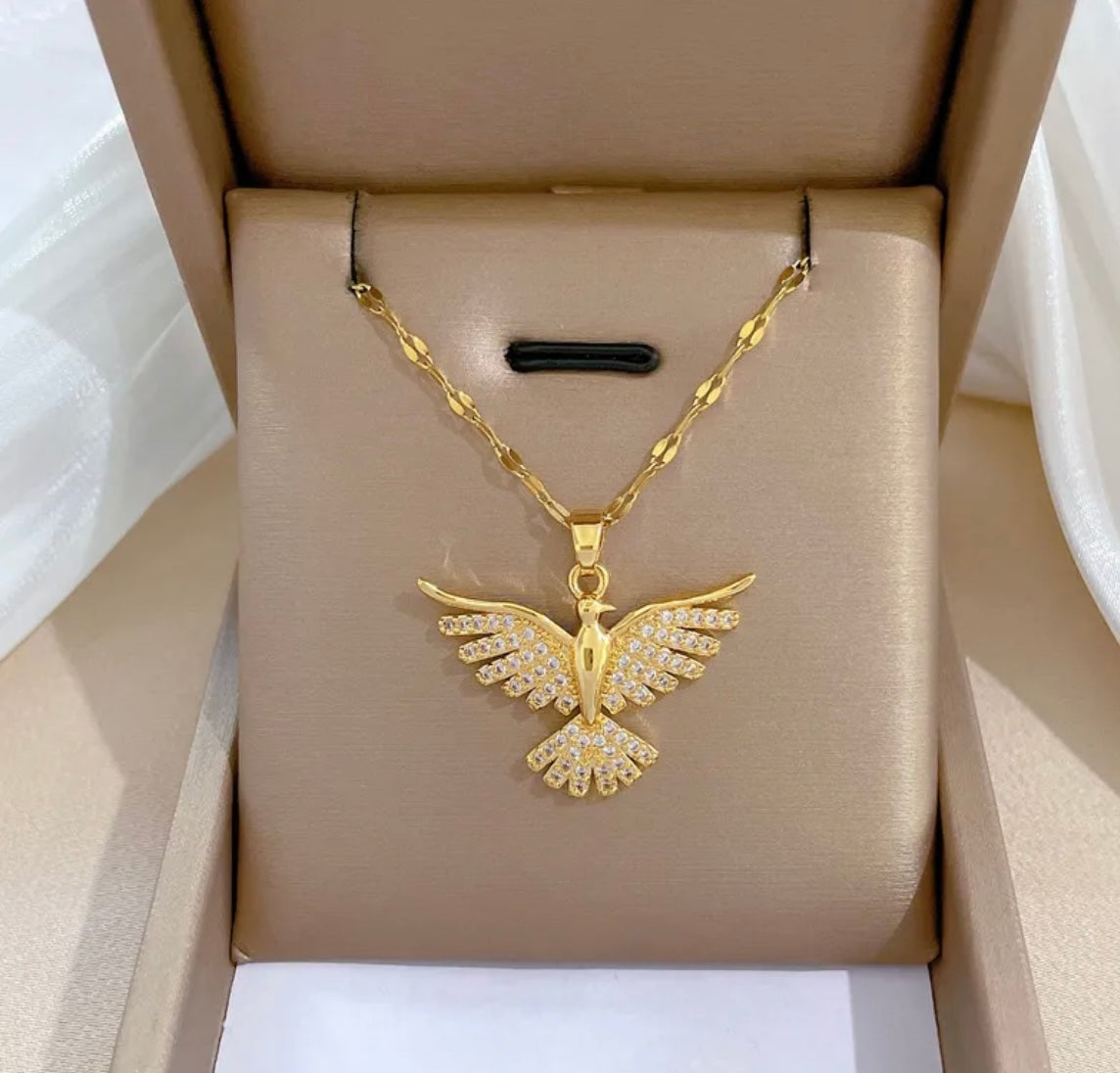 Gold eagle pendant necklace